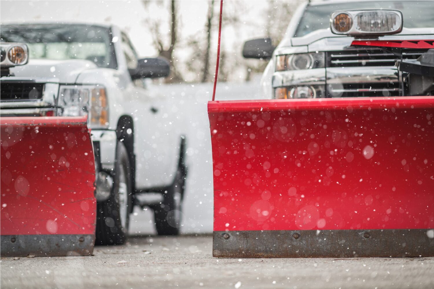 Adjustable Commercial Grade Plow Blades Installed on a Pickup Trucks.